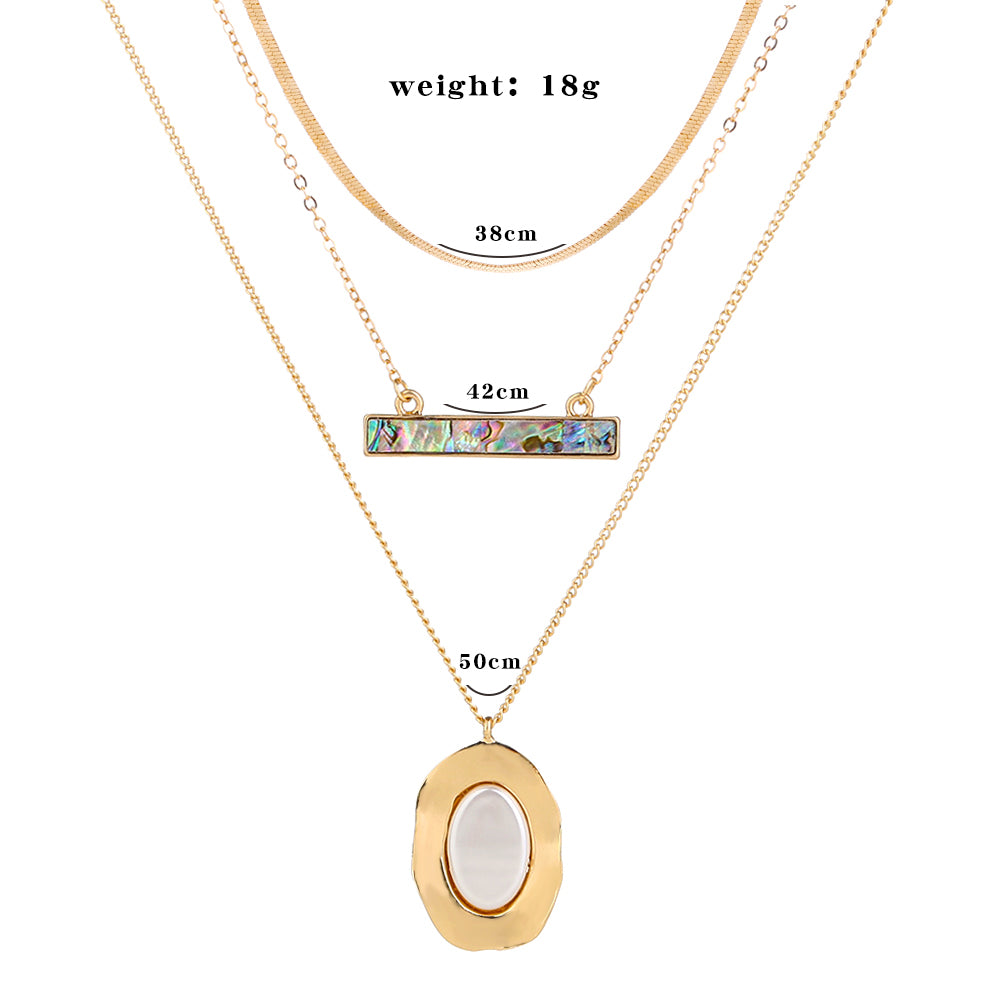 Colliers perles plates ovales blanches pures