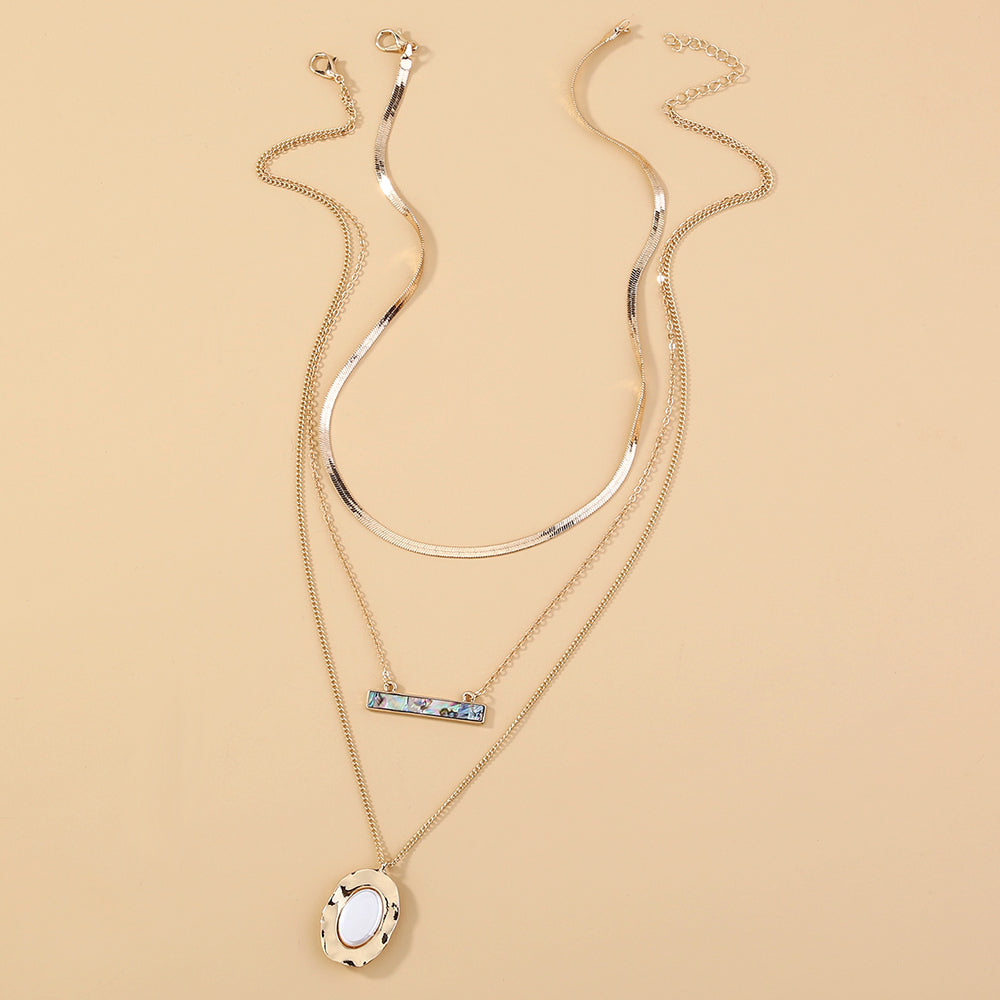 Colliers perles plates ovales blanches pures